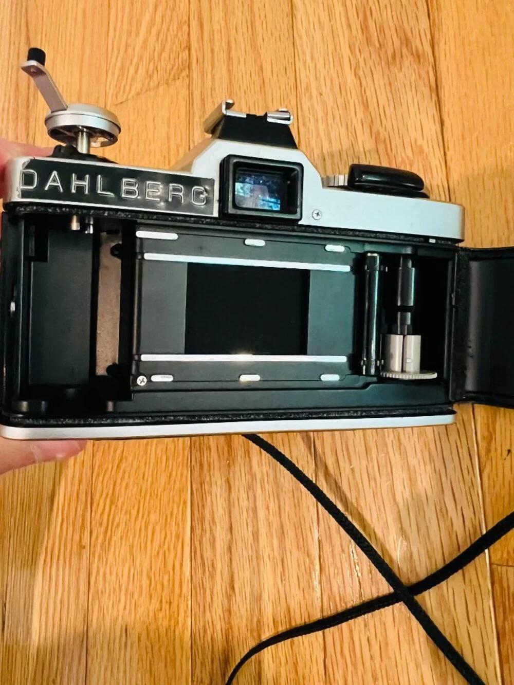 vintage Minolta XG-9 35mm SLR film camera equipped with a 50mm prime lens